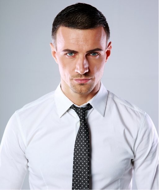 demo-attachment-2063-portrait-of-a-confident-man-over-gray-background-PDL3Q9F